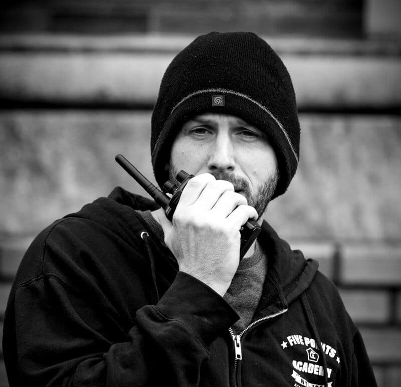 Frank Alfano Jr. on set with walkie-talkie